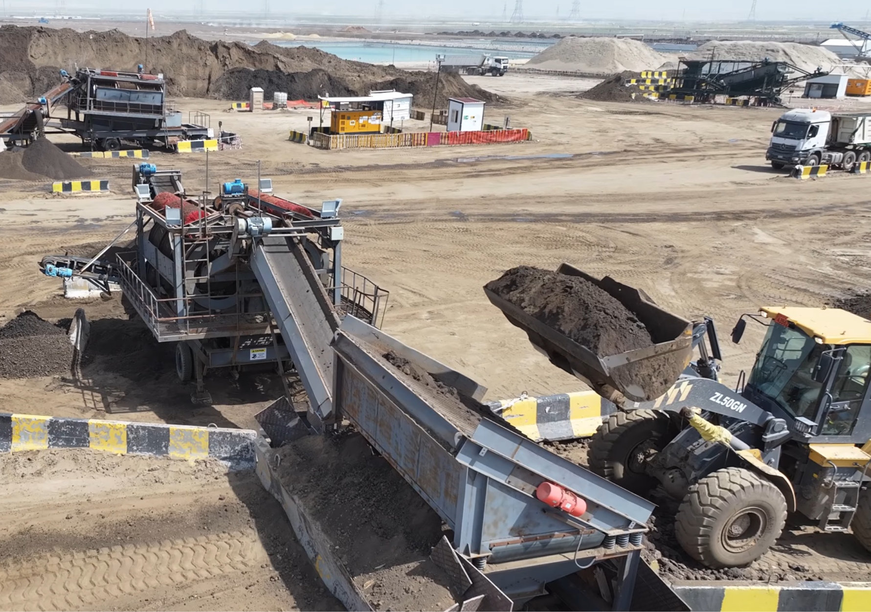 Double trommel Mobile Screening Unit - Wet oil Contaminated Material Image